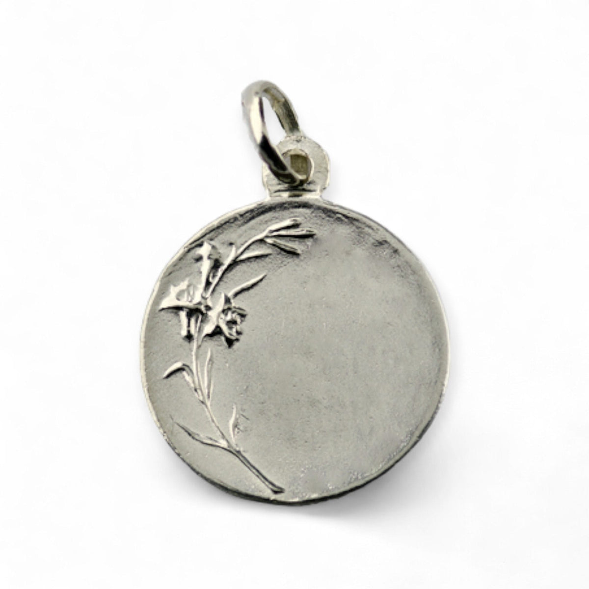 Medalla de la Virgen Niña en plata - 19mm detalle