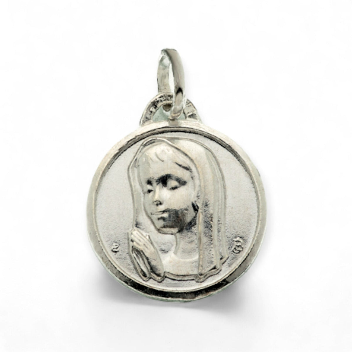 Medalla de la Virgen Niña en plata