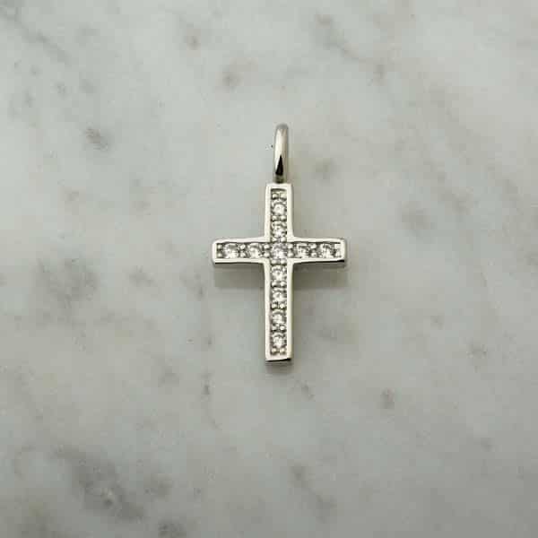 Cruz de plata y circones