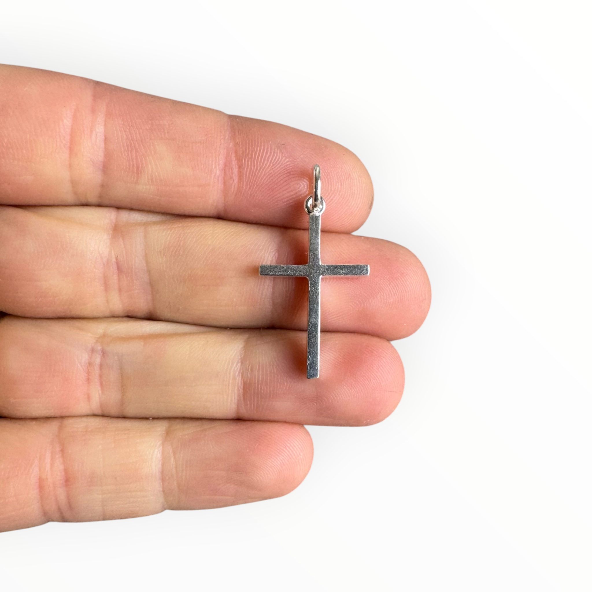 Cruz de Plata en una mano