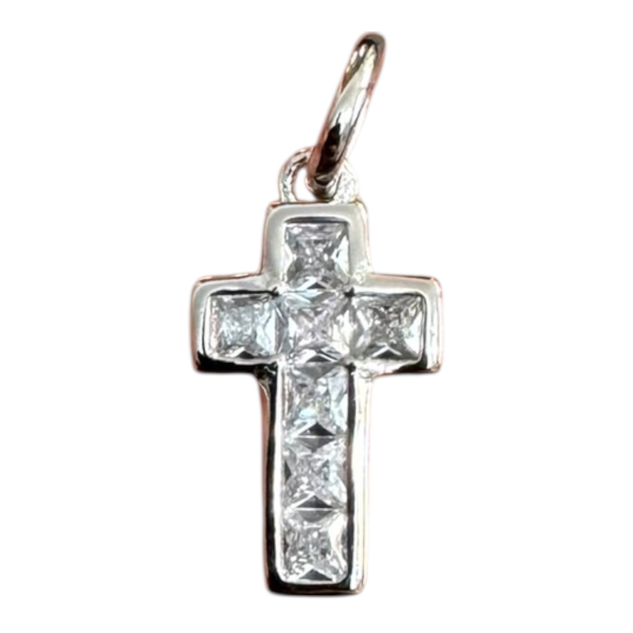 Cruz de plata y circones