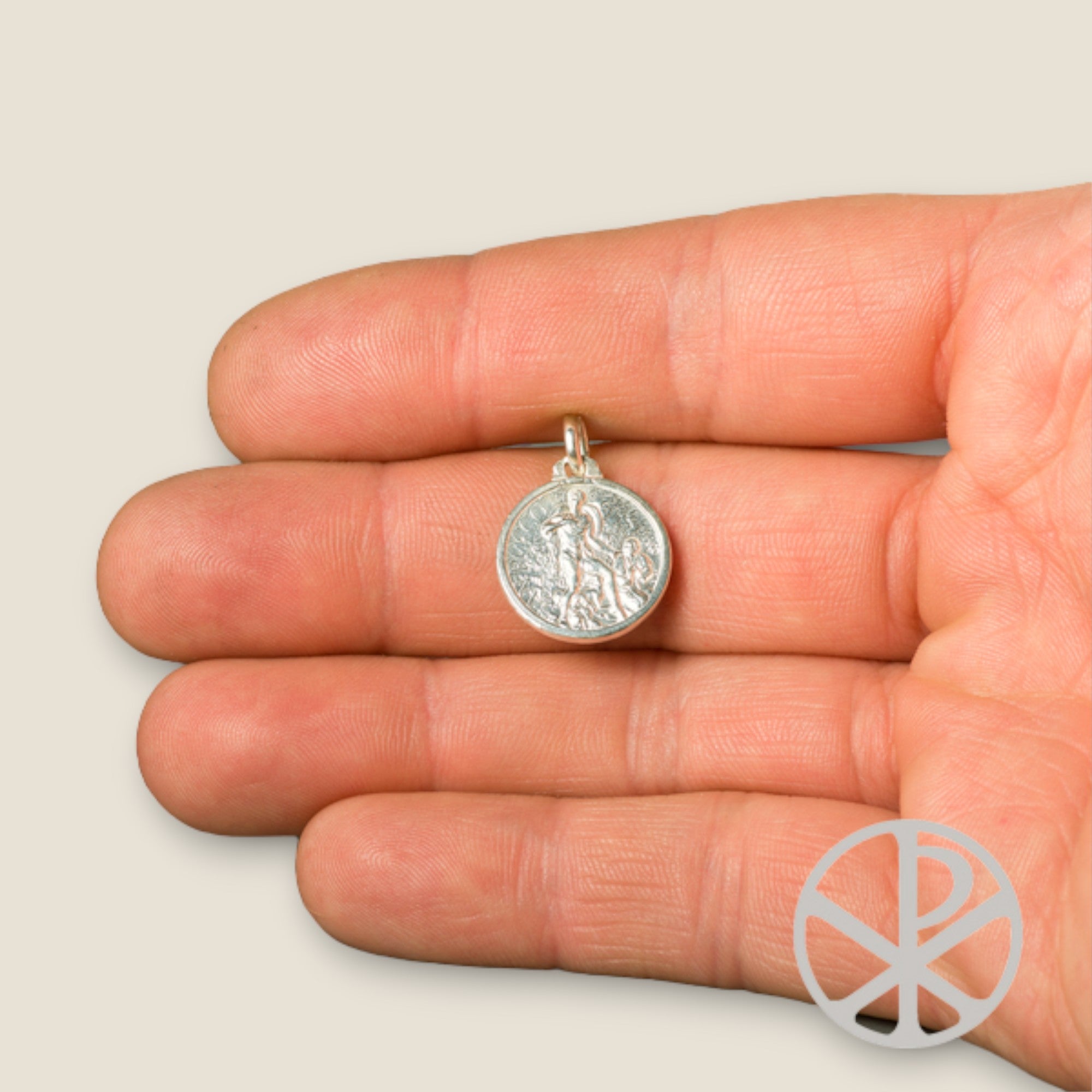 medalla-san-roque-plata-mano