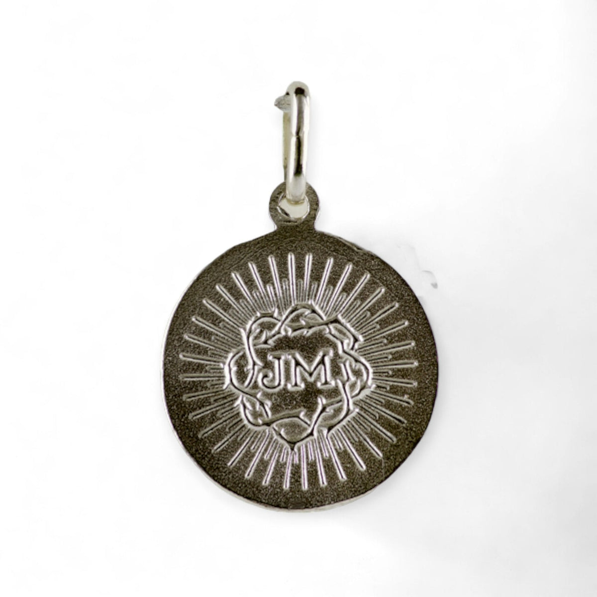 Medalla del Niño Jesús de Praga en plata - detalle