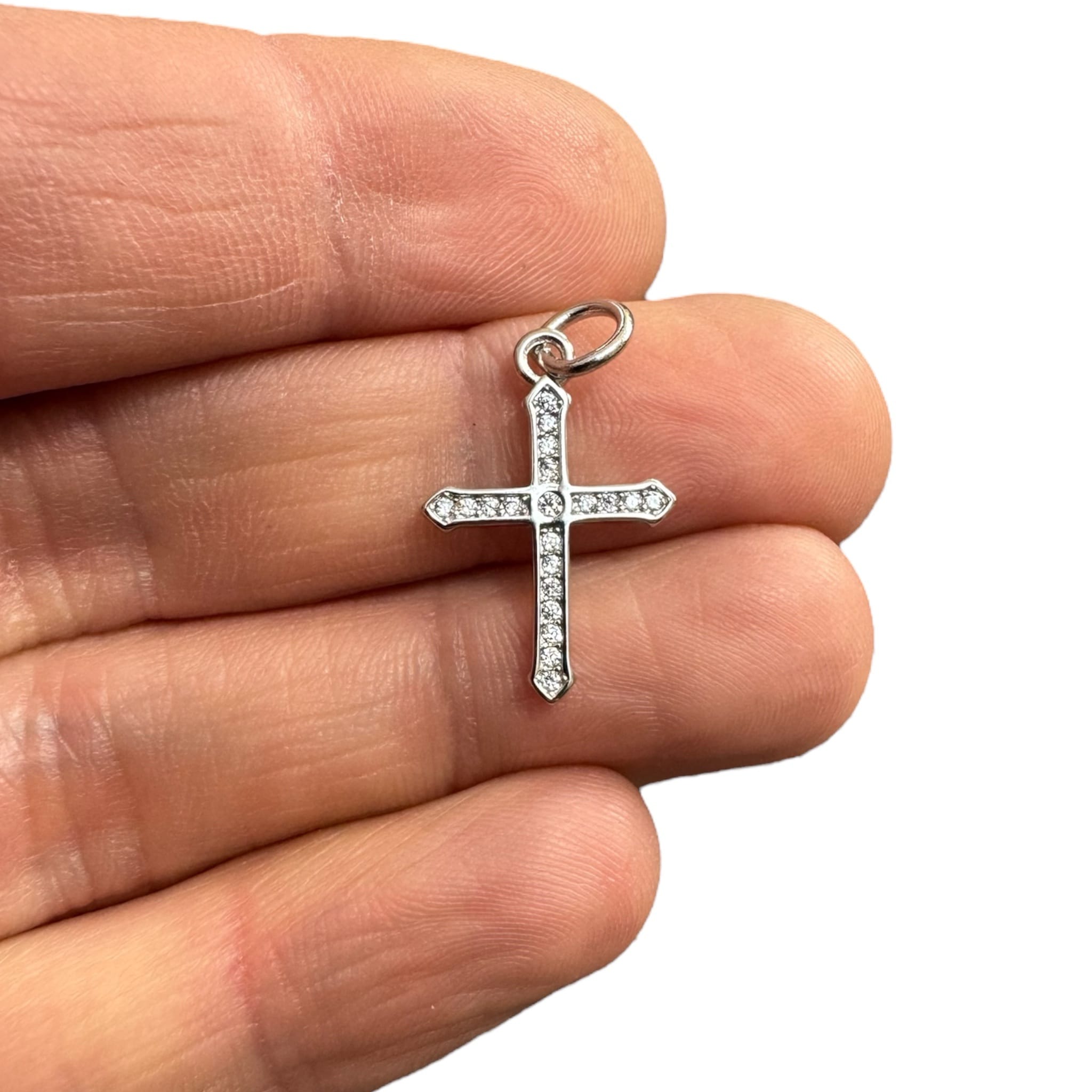 Cruz de plata y circones