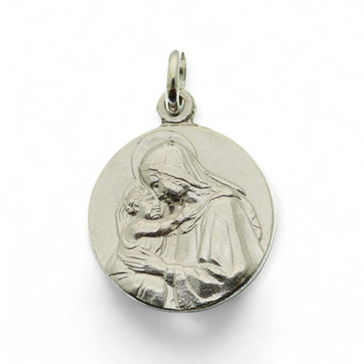 Medalla de la Virgen con el Niño en plata