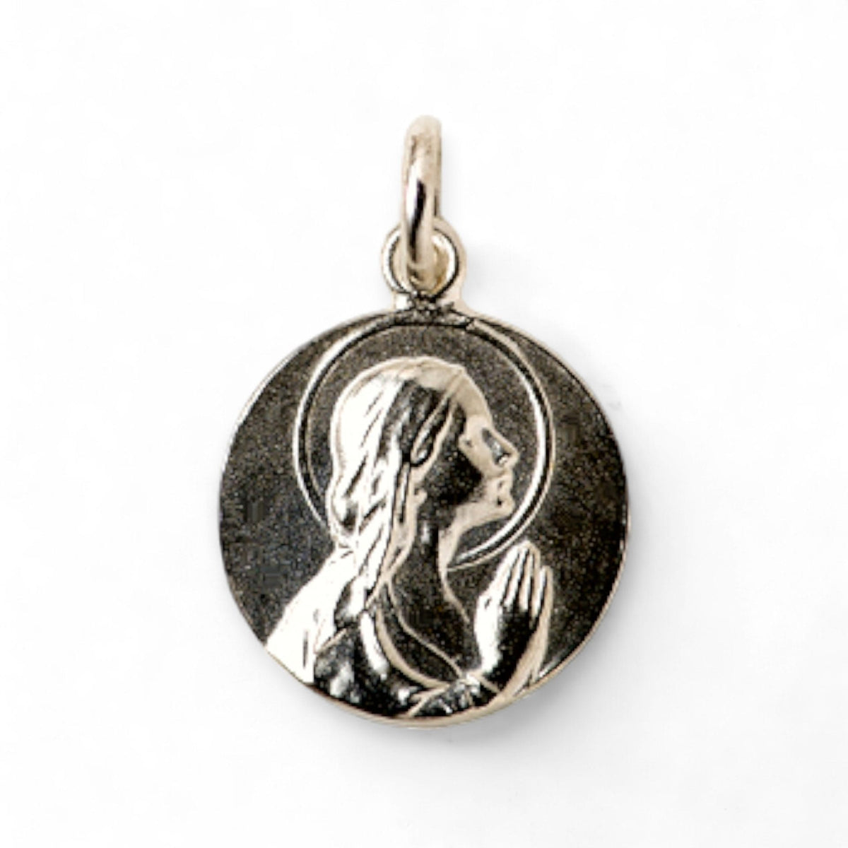 Medalla de la Virgen Niña Orando en plata